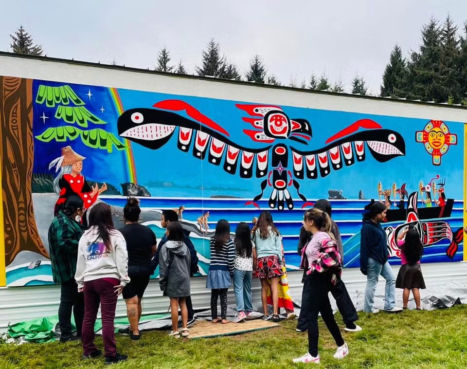   Children from the Hoh Tribe immediately ran up to soak in the painting.  