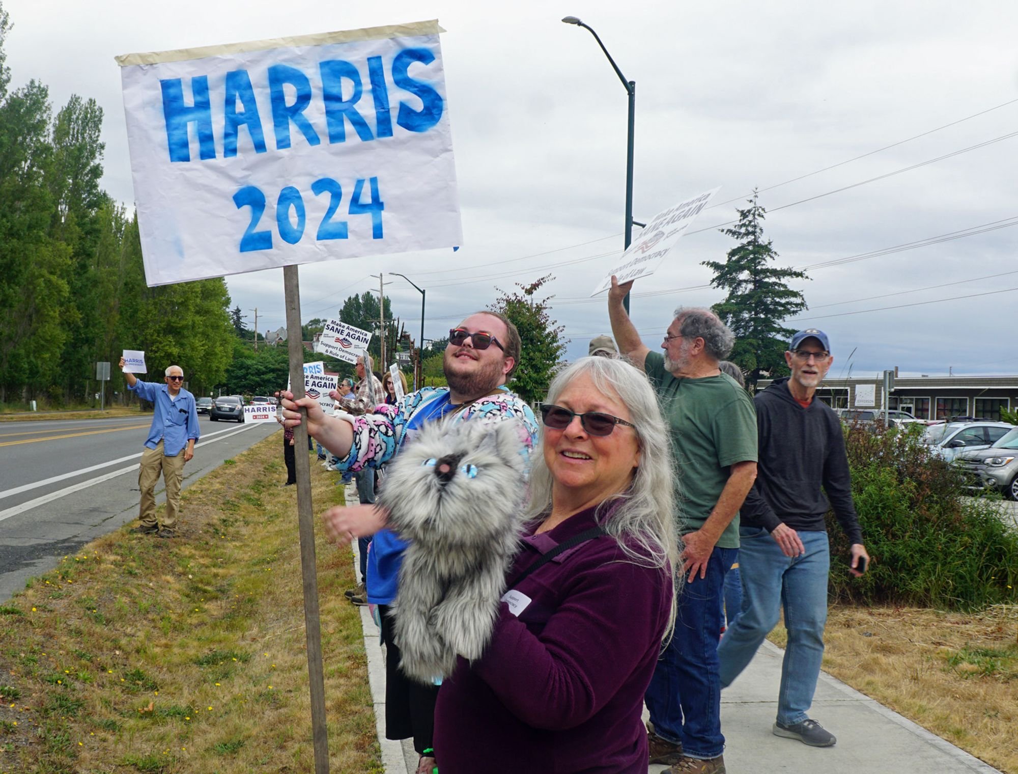   Susan Stone brought a symbolic stuffed cat to last week’s Kamala Harris rally.  