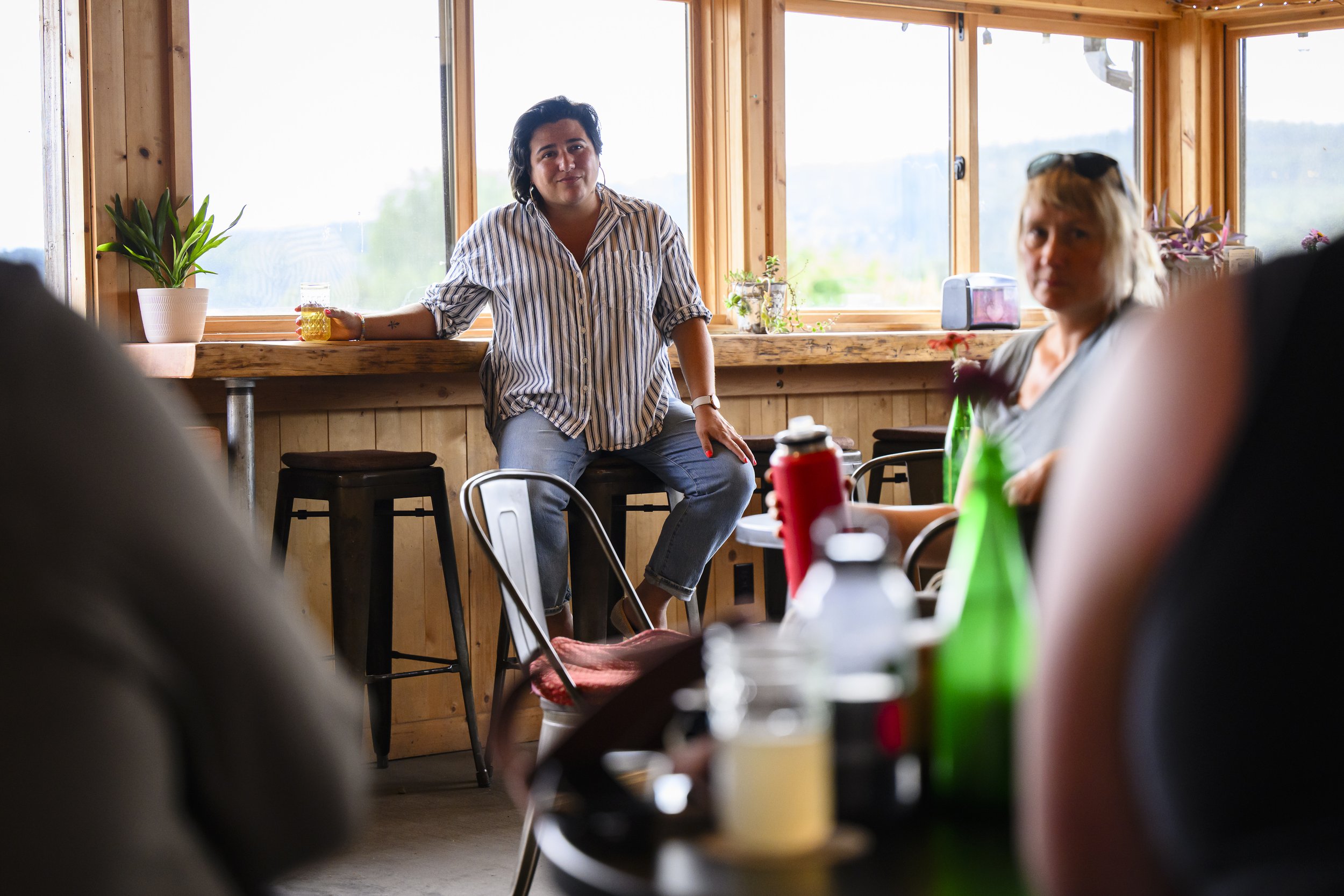 Rep. Emily Randall listening to farmers at Finnriver in Chimacum. Photo by Heather Johnson