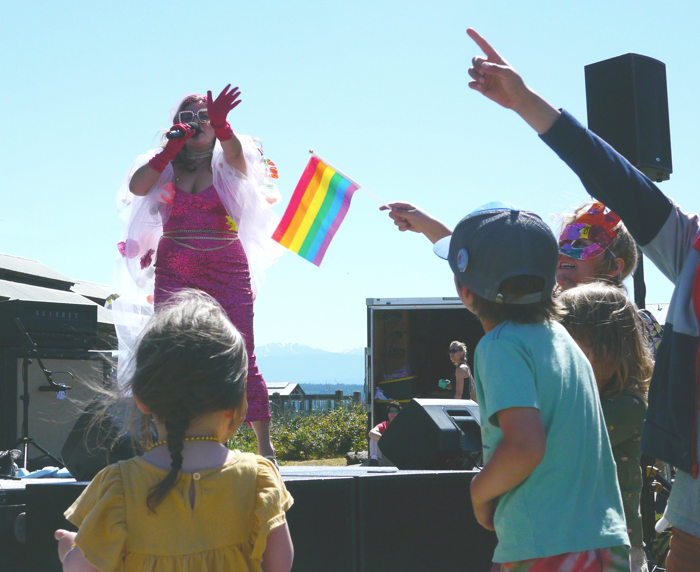   MC Caela Bailey entertains young allies at Port Townsend Pride. Photo by Nhatt Nichols  