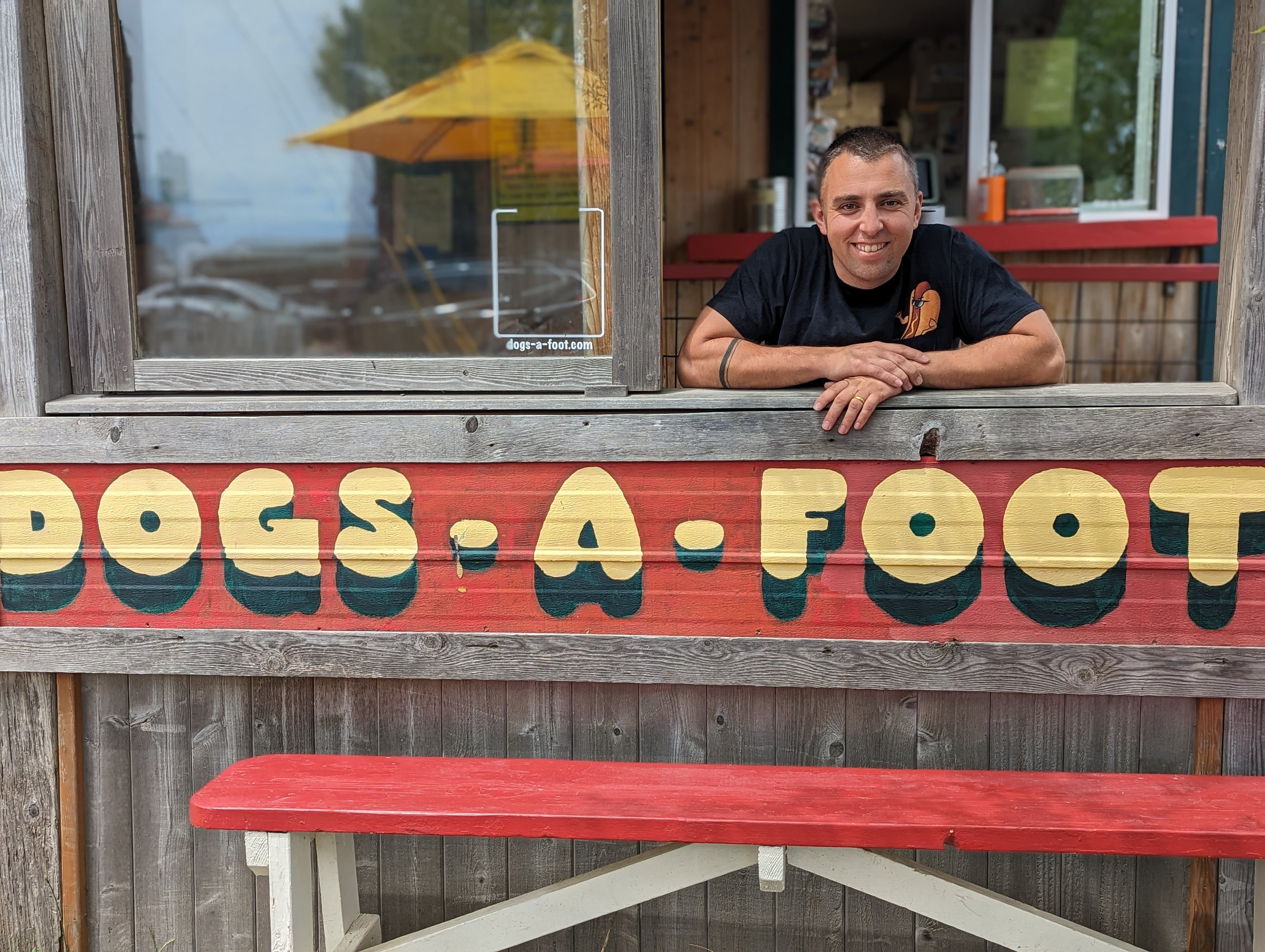   Cameron Roberts in his hot dog stand  
