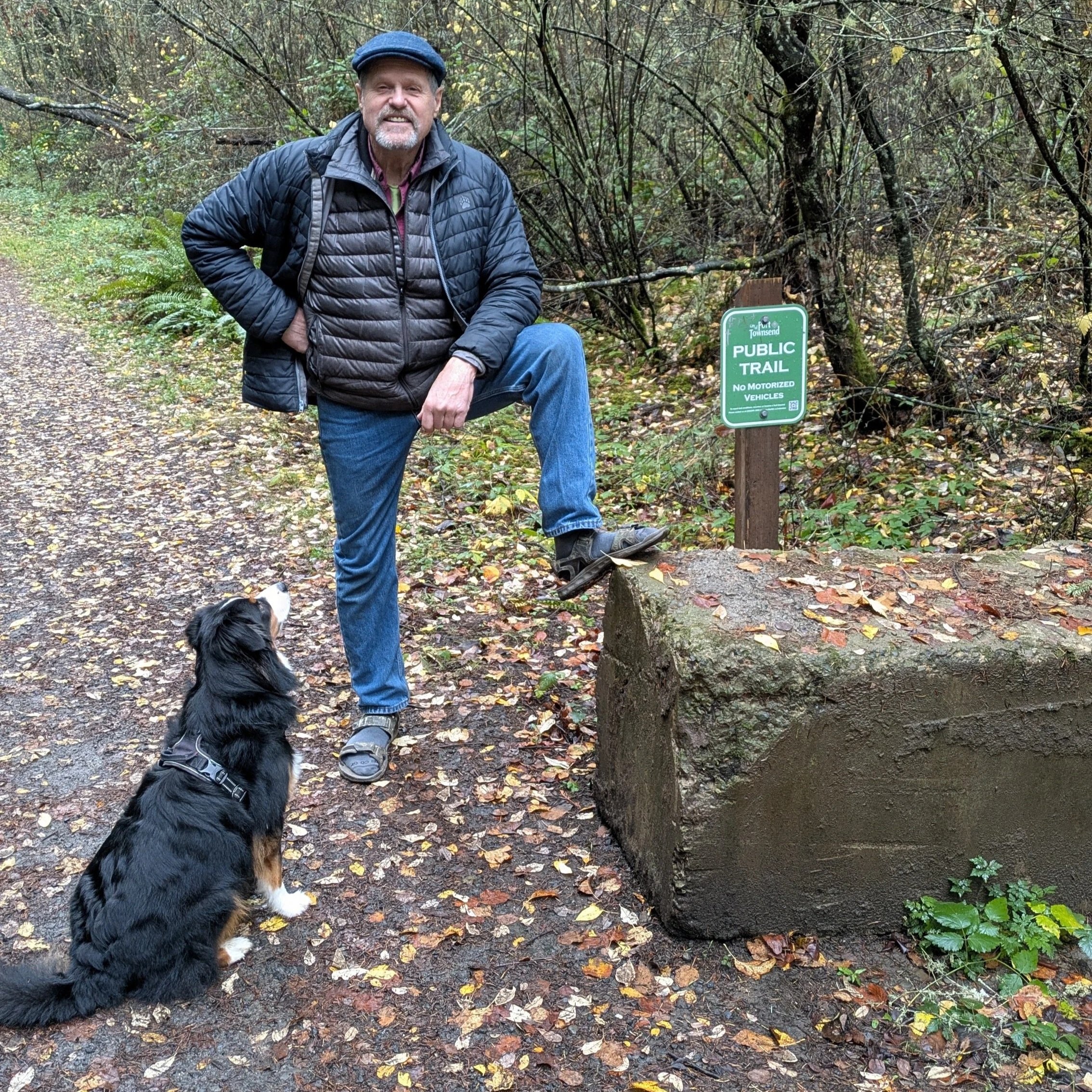  Scott Walker and Obsidian on one of the many trails of the system that Walker started almost 40 years ago. Photo by Scott France  
