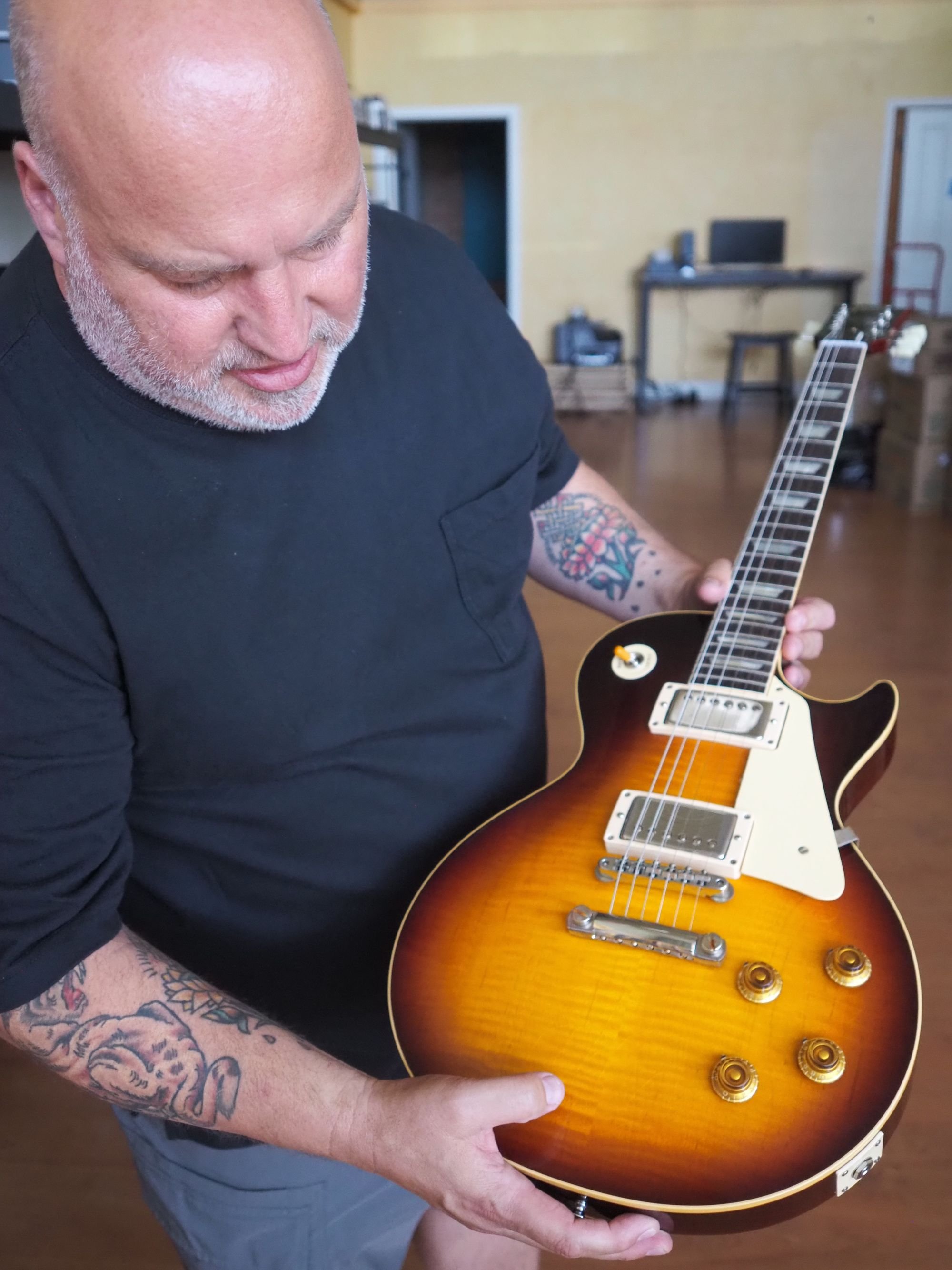   If you look closely, you might be able to see the cracks of aging added to this brand new Gibson 1959 re-issue where a changed formula in the finish shrinks and cracks the way it would have if it were actually 60 years old. Photo by Derek Firenze.  