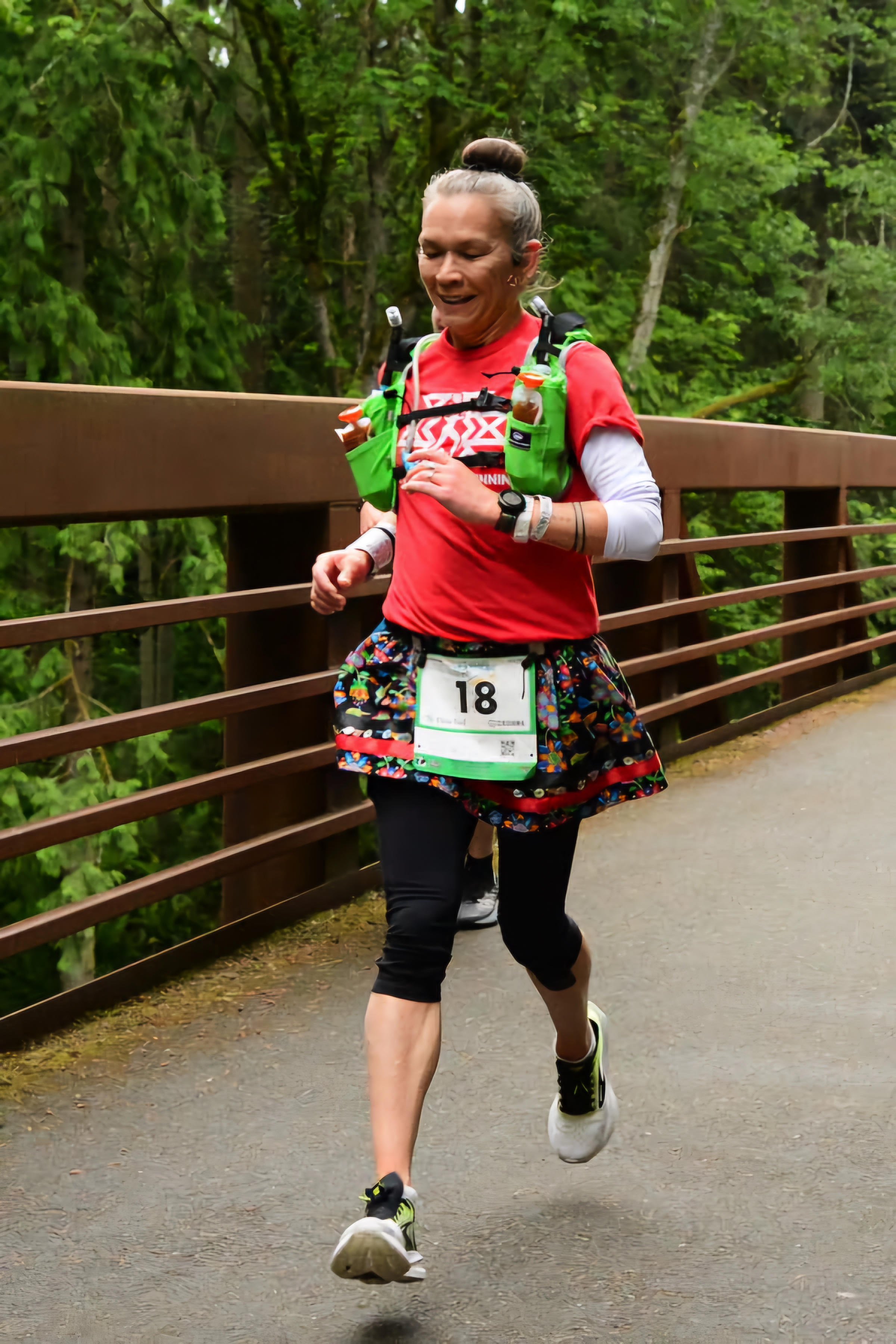 Sabrina McQuillen Hill crosses one of bridges on the North Olympic Discovery Marathon route in June 2024. photo courtesy of Sabrina McQuillen Hill.