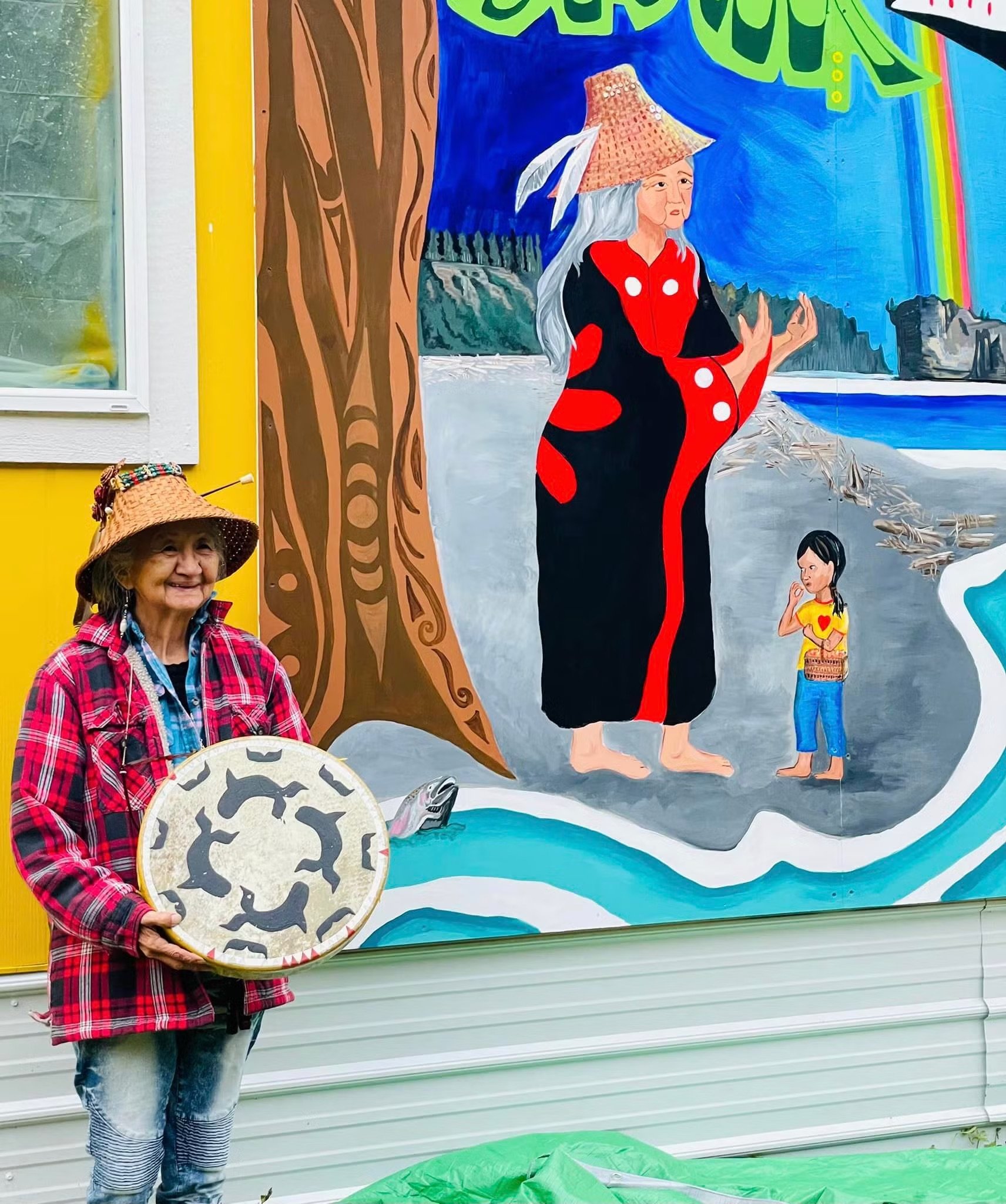   Storyteller Vivian Lee was one of the women used to model the Grandmother figure in the mural.  