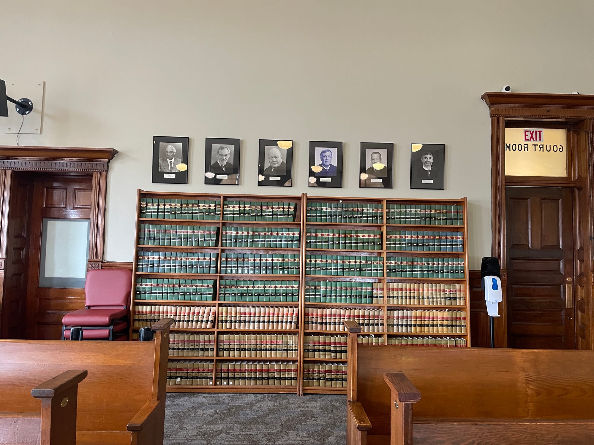 &nbsp;Inside the Superior court room, portraits of past Judges and law books