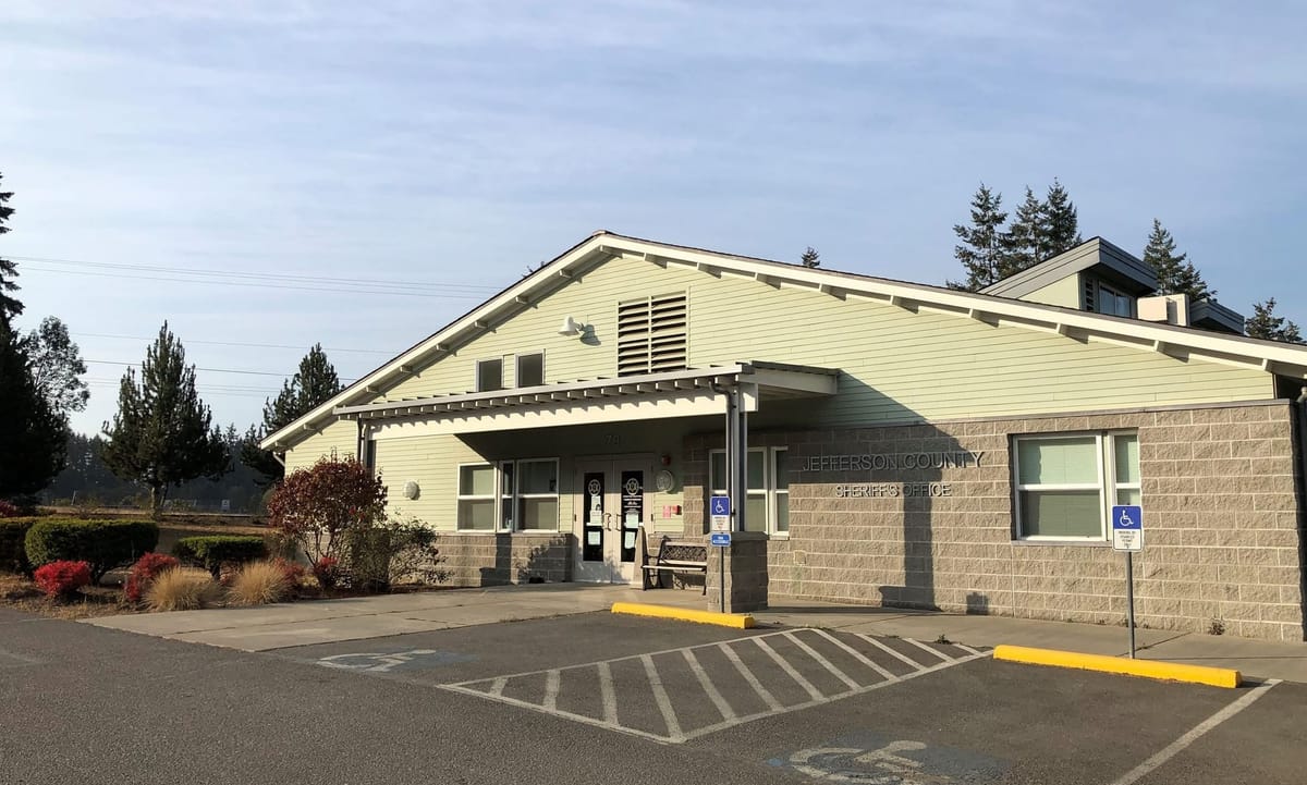 Jefferson County Sheriff’s Office a tan stone brick and beige plank building 