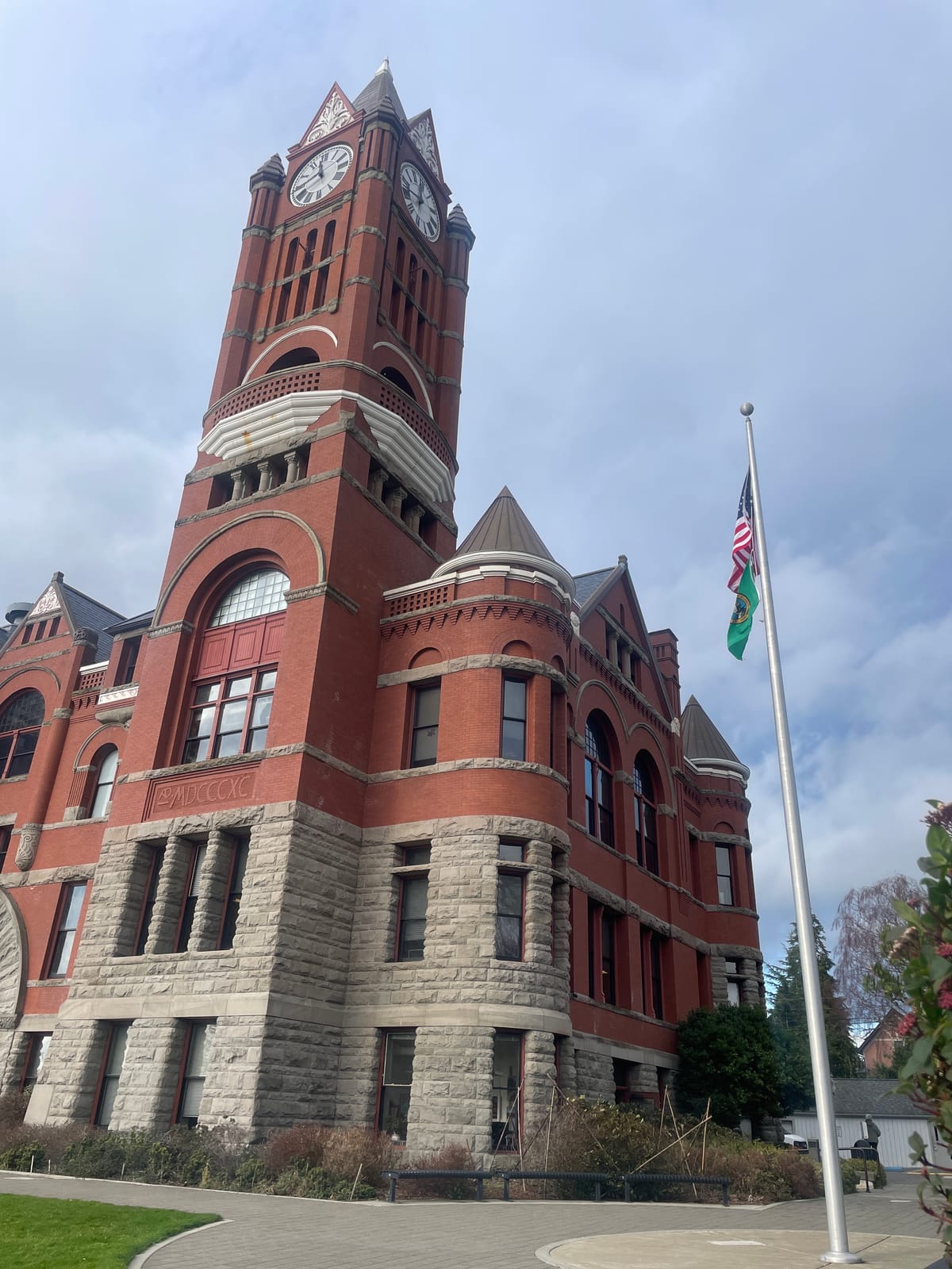 Outside the Jefferson County Courthouse, view of red brick clock tower